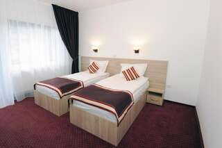 Гостевой дом Casa Tad Буштени Двухместный номер с 2 отдельными кроватями-1